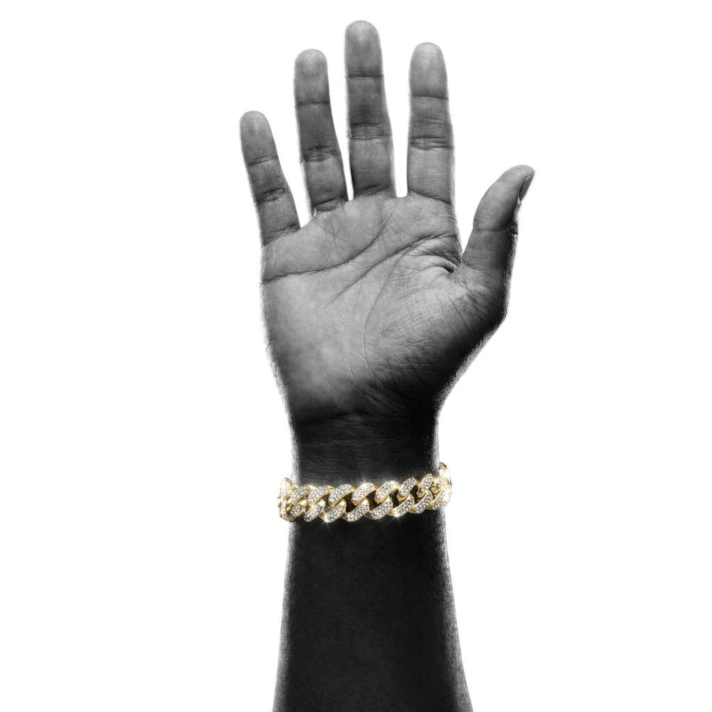 Gold Cuban bracelet on raised hand